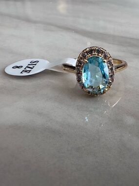 Blue Topaz Oval Halo Cocktail Ring - Gold Tone